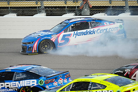 Kyle Larson (5) hits a wall during the race